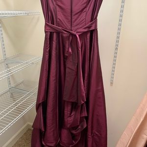 Maroon evening gown with flounces and pickups